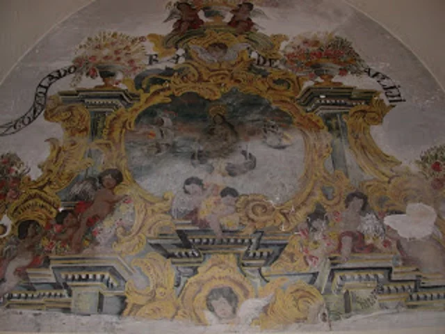 Pintura mural en la capilla de Gracias que representa la leyenda de la Virgen de Consolación